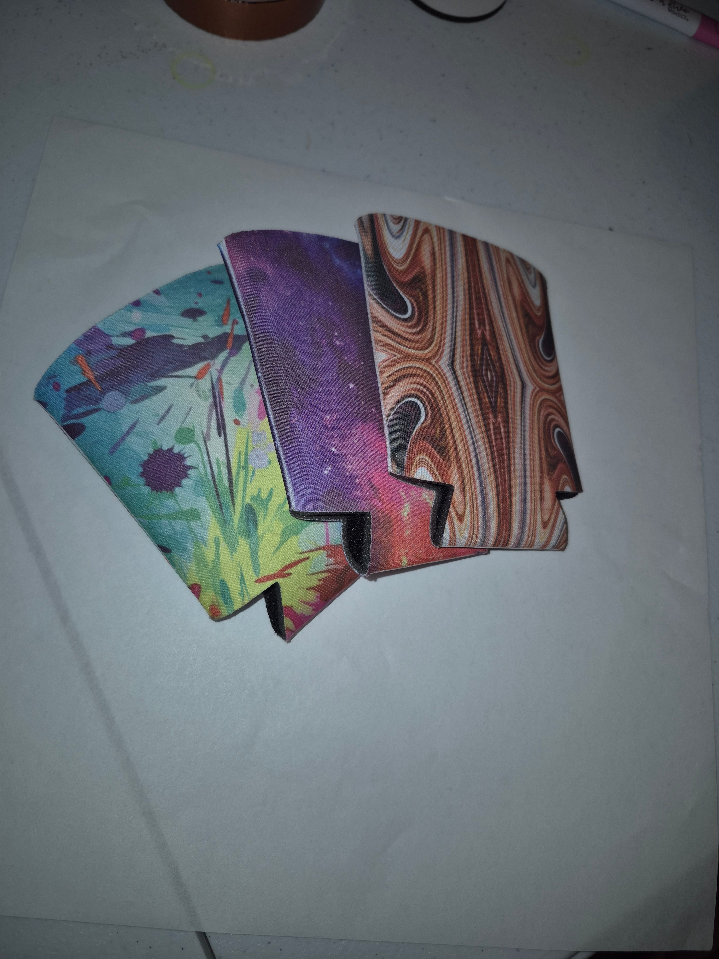 Colorful designs on koozies